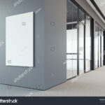 stock-photo-empty-white-poster-on-the-office-gray-wall-d-rendering-423759649