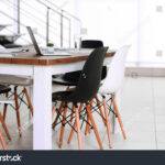 stock-photo-modern-office-furniture-set-with-table-and-chairs-laptop-on-the-table-391387786